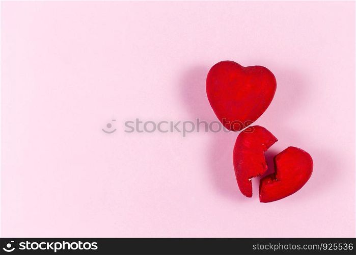Heart from hand made on the pink background.Concept of love.