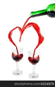 Heart from pouring red wine in goblets isolated on white
