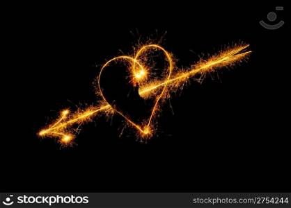 Heart from sparks. It is isolated on a black background