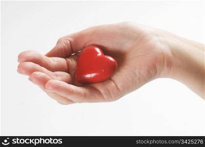 Heart in hand conceptual image. Love, care, health themes.
