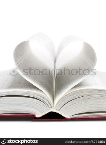Heart in the form of sheets of the book isolated on white, studio shot