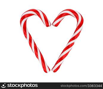 Heart made from christmas candies isolated on white background