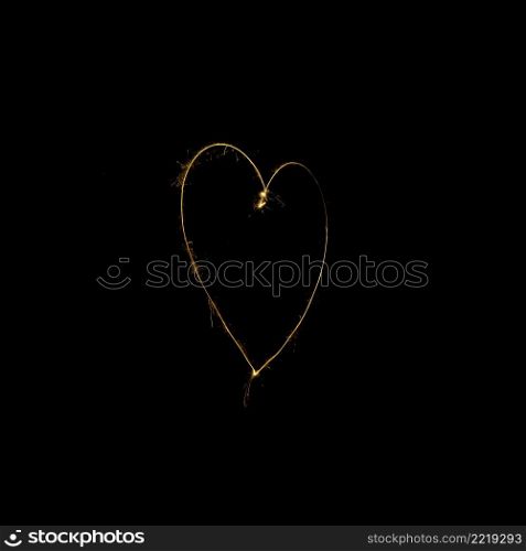 heart made from sparkler black background