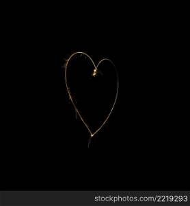 heart made from sparkler black background