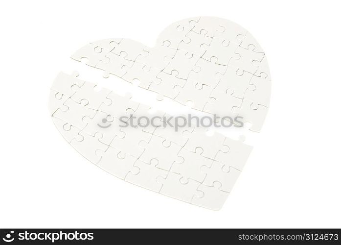 heart made from the puzzle on white