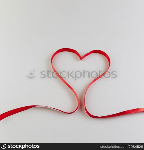 heart made red satin ribbon