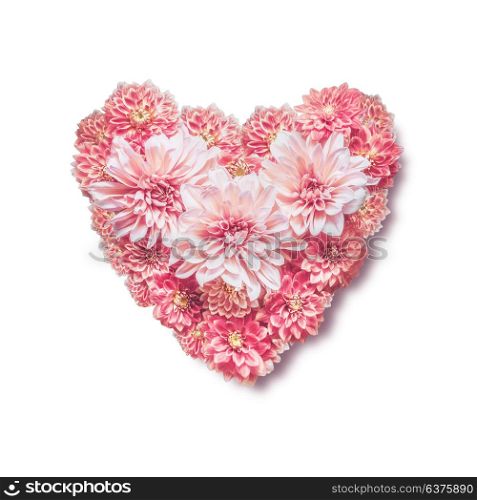 Heart made with pink flowers, isolated on white background, top view. Love, wedding or Valentines day concept. Layout for greeting card
