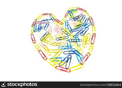 heart of paper clips on white background