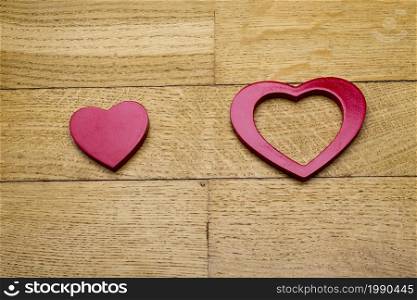 Heart on wooden floor as background.. Heart on the wooden floor.