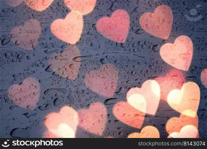 heart shape and raindrops on the window