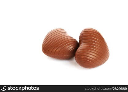 Heart shape chocolates isolated on white background.