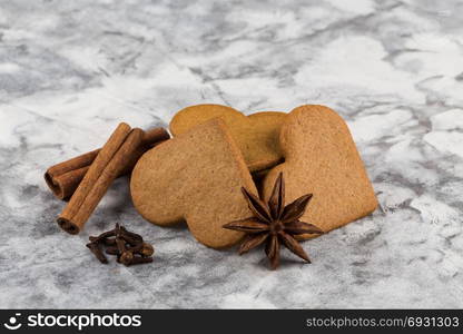 Heart shape christmas gingerbread cookies cinnamon - new year composition