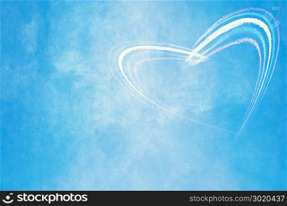 Heart shape color painted on blue wall for valentine and wedding background.