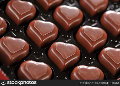 Heart shape delicious chocolate in box close-up