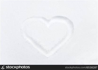 Heart shape drawing on white snow. Heart shape drawing on white snow as love valentine background