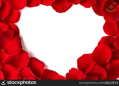 Heart shape frame made of rose petals, white isolated copy space. Heart frame of petals