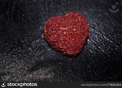 Heart shape in heavy rain. Close-up view