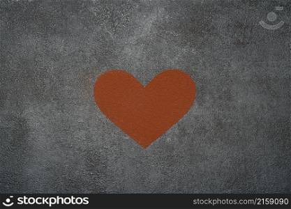 Heart shape made of grinded coffee or cocoa powder on concrete background.. Heart shape made of grinded coffee or cocoa powder on concrete background
