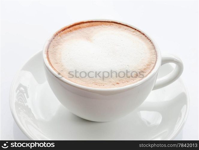 Heart shape of milk microfoam on coffee latte