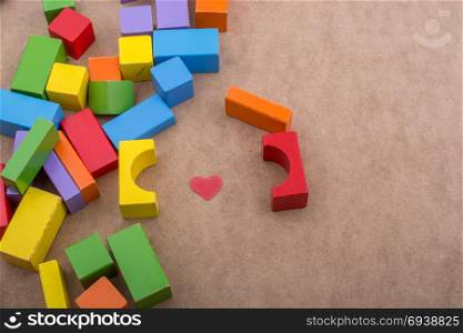 Heart shape placed between building blocks