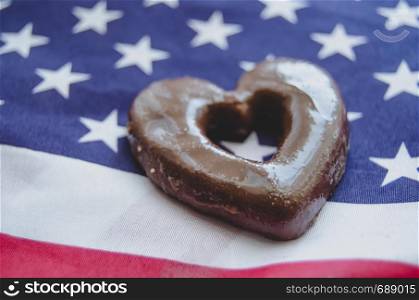 heart shaped biscuits and usa flag on wooden table - happy memorial day.. heart shaped biscuits and usa flag on wooden table happy memorial day.
