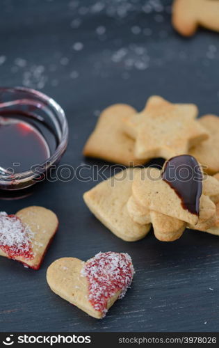 Heart-shaped cookies on a wooden background.