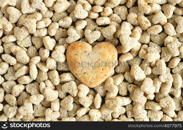 Heart shaped cookies on wooden table background