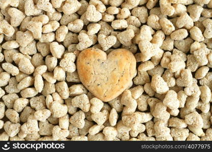 Heart shaped cookies on wooden table background