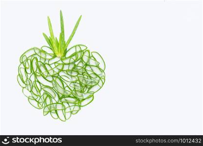 Heart shaped fresh slices of Aloe Vera, Aloe Vera is a popular medicinal plant for health and beauty, White background with copy space
