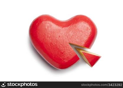 Heart shaped Gouda cheese on white background