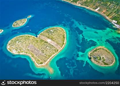 Heart shaped island of Galesnjak in Zadar archipelago aerial view, Dalmatia region of Croatia