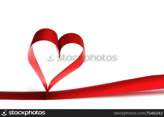 Heart shaped red ribbon isolated on white background