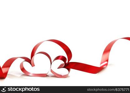 Heart shaped red ribbon isolated on white background. Heart shaped ribbon