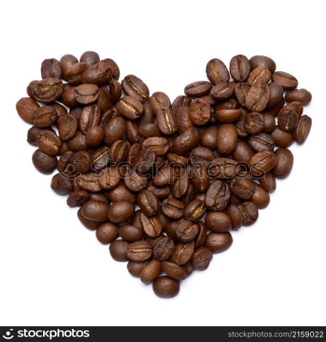 Heart shaped roasted coffee beans isolated on white background.. Heart shaped roasted coffee beans isolated on white background