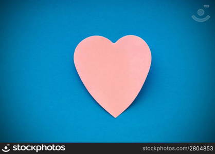 Heart shaped sticky notes on the background