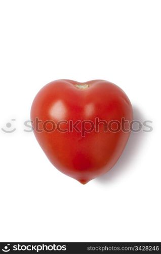Heart shaped tomato on white background