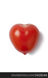 Heart shaped tomato on white background