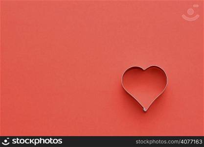 Heart symbol in red, symbolizes love/romance