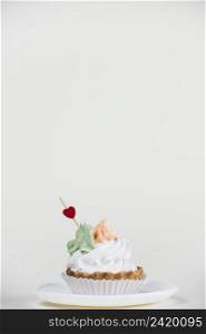 heart topper cupcake white table