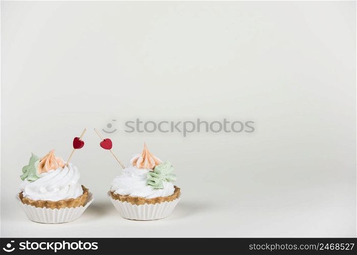 heart toppers two cupcakes table