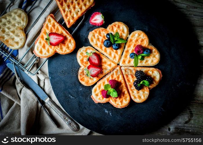 Heart waffles with berries
