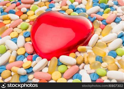 heart with pills. colorful pills. medical background