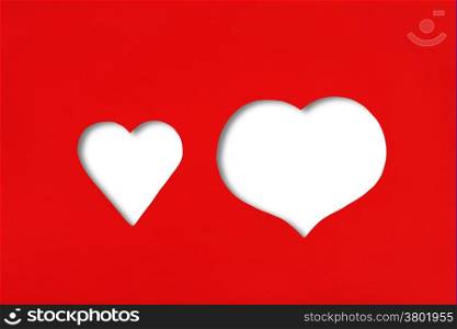 Hearts shaped cut on red paper with white blank
