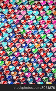 Hearts, stickers with names on a street sale
