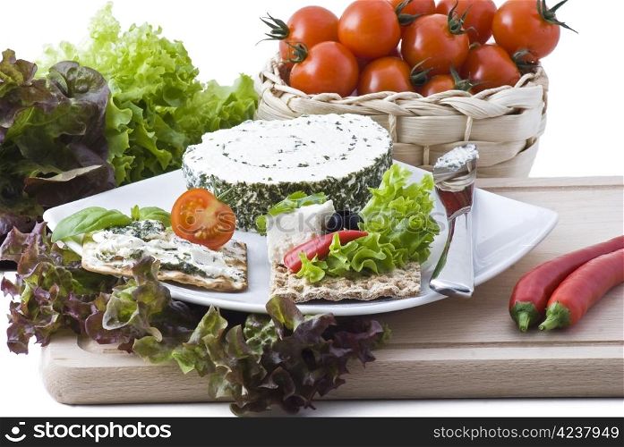 Heathly crackers with cheese, herbs, salad, tomato, olives and peppers