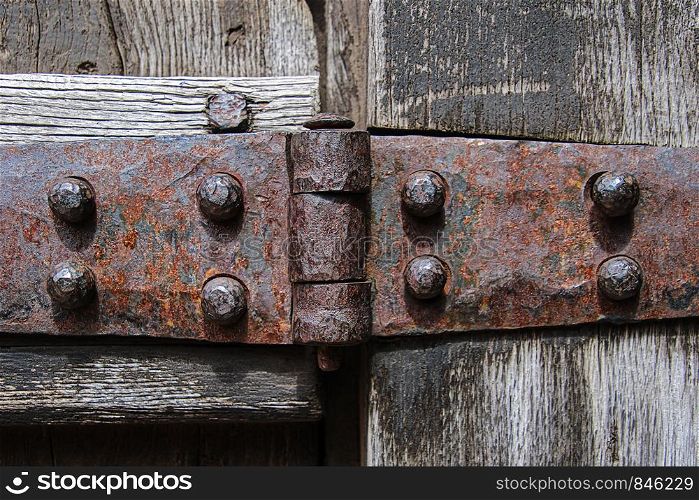 heavy antique iron hinge close up