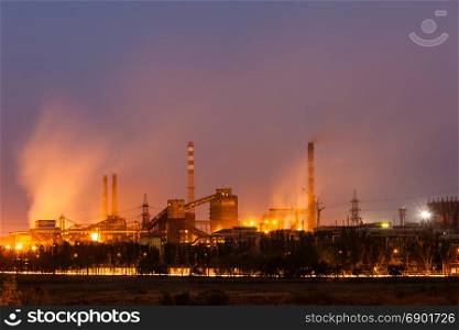 Heavy industry air pollution image. Metallurgical plant smoke chimney