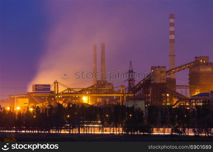Heavy industry air pollution. Metallurgical plant smoke chimney