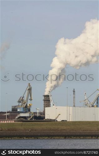Heavy industry area with smoking chimneys