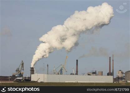 Heavy industry area with smoking chimneys